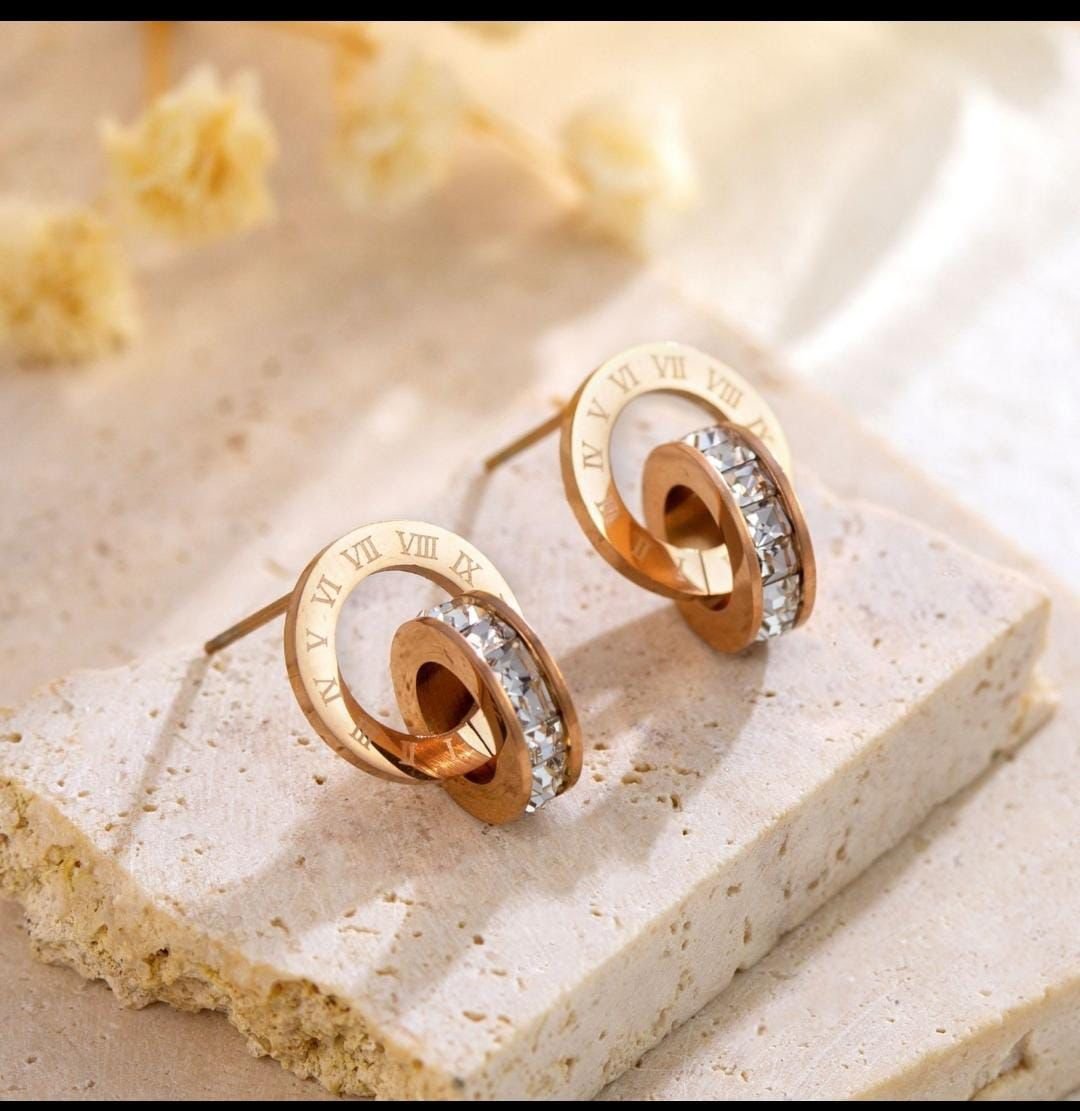 WhatsApp-Image-2026-03-10-at-3.06.46-PM-1.jpeg Luxury Roman Numeral Crystal Stud Earrings – Gold Finish - Image 1